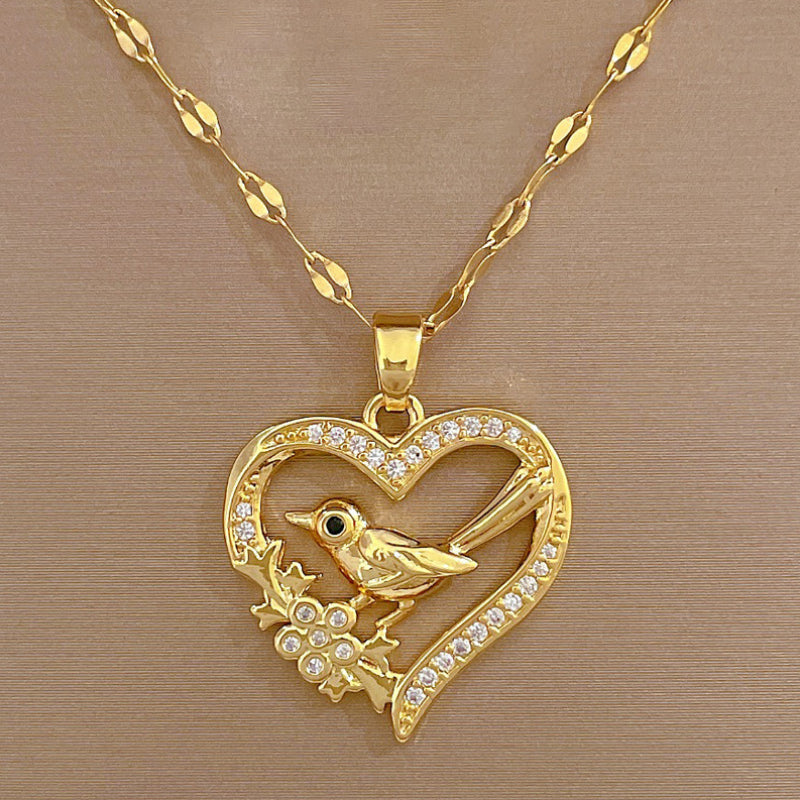 Luxurious 14k gold bird necklace