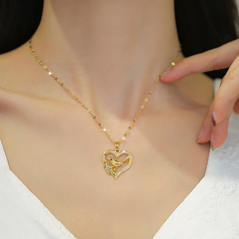 Luxurious 14k gold bird necklace