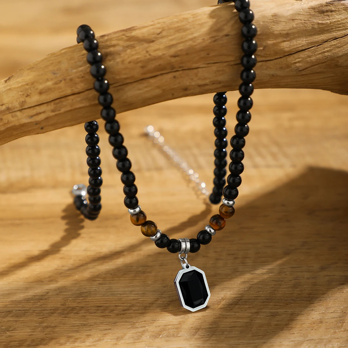 Square pendant necklace with black beads 