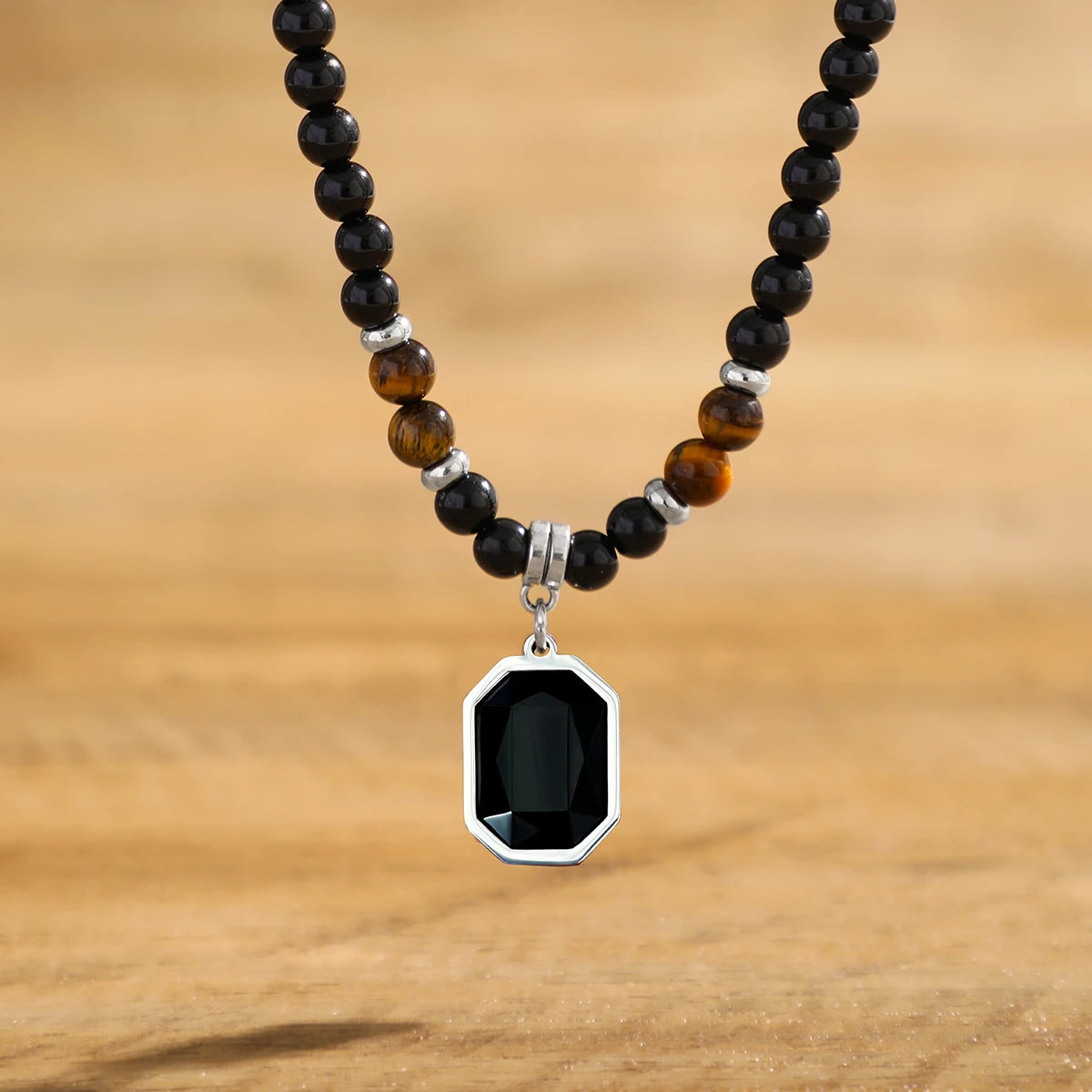 Square pendant necklace with black beads 